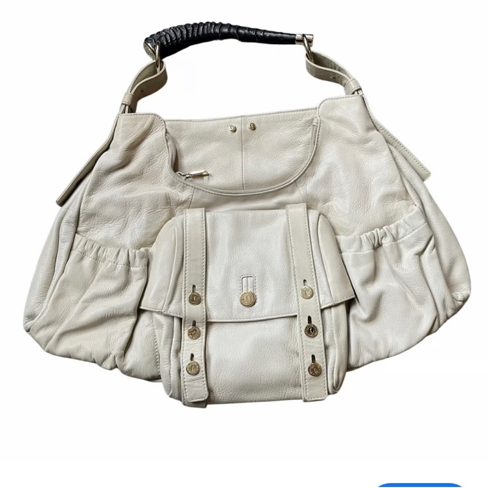 VINTAGE Yves Saint Laurent
White leather Mala Mala Horn Bag